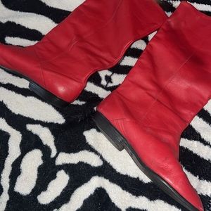 Red Peter Pan style boots